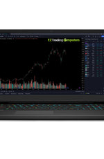 EZ Trading Computers trading laptop, open, a candlestick chart and live watchlist filling the screen above a backlit keyboard